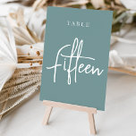Tarjeta De Mesa Dusty Verde azulada mano Tabla con guiones QUINCE<br><div class="desc">Las tarjetas de número de tabla simples y de moda en agua verde azulada polvorienta y blanco hacen una declaración elegante en su boda o evento. Las funciones de diseño "table [number]" se encuentran en una mezcla de letras clásicas de sif y manuscritas. El diseño se repite en ambos lados....</div>