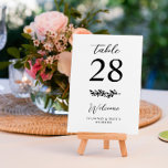 Tarjeta De Mesa Elegante Boda Romántico de Verdor<br><div class="desc">Elegante tarjeta de mesa de boda con una combinación de un guión boda clásico y un serif elegante,  una ramita verde y fuentes negras sobre un fondo blanco.</div>