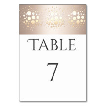 Elegante confeti moderno de oro/bronce