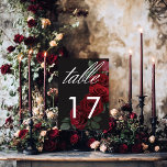 Tarjeta De Mesa Elegante moreno rojo de sangre rojo de color flora<br><div class="desc">Acepte la elegancia atemporal para su celebración inspirada en el gótico con nuestra cautivadora tarjeta de número de mesa boda. Un suave fondo negro proporciona el lienzo perfecto para un ramo cautivador pero sobrio. Imaginen un arreglo de sangre enloquecida y roja en flor de rosa, donde ricos tonos rojos se...</div>