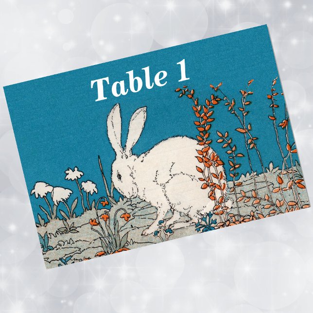 Tarjeta De Mesa Flores de conejo blanco ventilado elegantes (White fluffy rabbit sitting in orange and white flowers on blue event table number cards.)