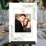 Tarjeta De Mesa Greenery Photo Name Date Boda<br><div class="desc">Este elegante eucalipto verde deja el número de la mesa con delicadas hojas de acuarela con su foto especial,  nombre y fecha enmarcado por un borde dorado. Diseñado por Thisisnotme©</div>