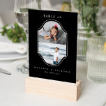 Tarjeta De Mesa Kids Table Number Fun Wedding Couple's Year Photo<br><div class="desc">A timeless, classic, and elegant kids' table number sign with a modern minimal aesthetic in classic black and white. Simple elegant kids' table with two photos to display the couple's photo as kids to correspond with the table number years of age. Simple typography arranged in a modern layout. **All colors...</div>