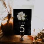 Tarjeta De Mesa Magnolia elegante Boda blanco y negro<br><div class="desc">Haga una declaración sofisticada en su día especial con nuestros elegantes signos de número de mesa de magnolia boda. Estos carteles le dan un toque glamuroso a la decoración boda. Con un magnolia blanca sobre un fondo de acuarela negro, los números de las mesas le proporcionarán un aire de sofisticación...</div>
