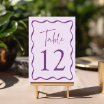 Tarjeta De Mesa Moderno Boda de marco ondulado morado<br><div class="desc">Añada un toque elegante a su celebración boda con estas tarjetas de mesa boda Wavy Frame Moderno. El diseño retro muestra "Table" en un guión morado escrito a mano con el número de tabla que se muestra a continuación. Un borde marrón violeta oscuro rodea el número de la mesa, contrastando...</div>