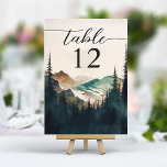 Tarjeta De Mesa Montañas acuáticas Boda de bosque de pinos<br><div class="desc">Asegúrese de que el asiento esté bien equipado con el número de tabla del Boda de los bosques de pino de las montañas acuarelas. Esta tarjeta, impresa en un material de tarjetas de alta calidad, cuenta con una serena escena acuarela de montañas y un bosque de pinos, lo que le...</div>