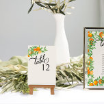 Tarjeta De Mesa Naranja Blossom Citrus Fruit Boda<br><div class="desc">boda de floración naranja número de mesa con naranjas, floración naranja, vegetación y follaje colgante sobre un fondo neutro. Diseño natural fresco, exquisito para complementar un boda primaveral o veraniego con un tema boda de frutas naranjas. Para coordinar invitaciones, papelería, día de evento y decoración de mesa, juegos y carteles...</div>
