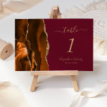 Tarjeta De Mesa Naranja quemado Agate de Oro Boda de Borgoña<br><div class="desc">Esta elegante y moderna tarjeta de boda con número de mesa cuenta con una acuarela de color naranja quemada bordeada por un falso purpurina de oro. El texto del personalizable combina la escritura a mano de color dorado y las fuentes cursiva y de copperplate en un fondo de color burdeos....</div>