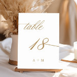 Tarjeta De Mesa Número de boda de caligrafía romántica dorada 18,<br><div class="desc">Mesa 18. Por favor,  revise todos los números disponibles. | Número de mesa de boda de caligrafía romántica y elegante con monogramas. ¡Para una personalización más avanzada de este diseño,  haga clic en el botón de herramienta de diseño azul de arriba!</div>