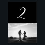 Tarjeta De Mesa Número de tabla de Boda de fotografías de guiones<br><div class="desc">Un hermoso diseño de guiones de caligrafía en blanco y negro que muestra la foto de la pareja. Un moderno diseño fotográfico de pareja boda con simples elementos minimalistas. Un diseño de número de tabla moderno y boda ideal para todo aquel que ame la caligrafía de guiones, diseños en blanco...</div>