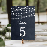 Tarjeta De Mesa Números de tabla de las luces de cadena azul de me<br><div class="desc">Moda verano boda moderno diseño de tarjetas de número de tabla con elegantes y sencillas luces de cuerda brillantes colgando por encima y una elegante mezcla de fuentes de escritura modernas y caligráficas sobre un fondo de textura falso color de agua impreso. Un diseño sencillo y elegante, perfecto para el...</div>