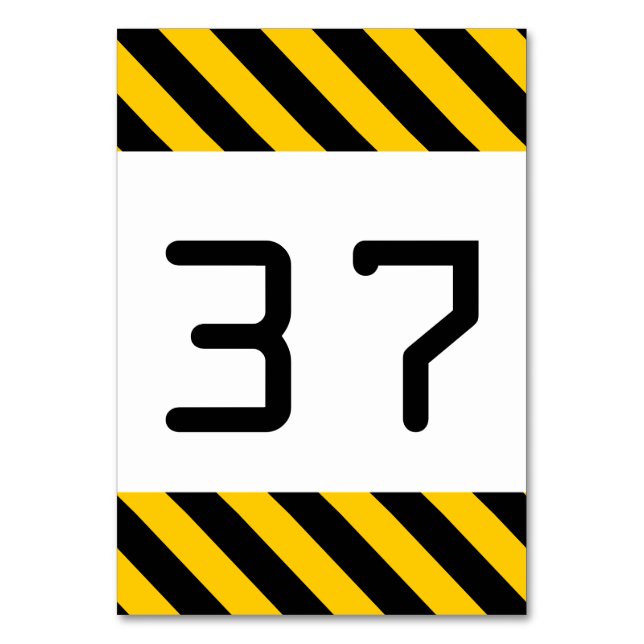 Tarjeta de mesa rayada negra y amarilla (Anverso)