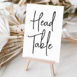 Tarjeta De Mesa Tabla de cabezales con guiones de mano blanca y ne<br><div class="desc">Las tarjetas de número de tabla simples y de moda en blanco y negro clásicos hacen una declaración elegante en su boda o evento. El diseño incluye la "tabla principal" en la escritura manuscrita. El diseño se repite en ambos lados. Las tarjetas numeradas individualmente se venden por separado; solicite cada...</div>