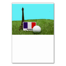 Torre Eiffel con bandera francesa y bola de golf