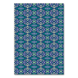 Tarjeta De Mesa Un patrón simétrico de motivos azules sobre un tej