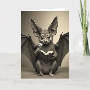 Tarjeta de Murciélago con Libro y Flor