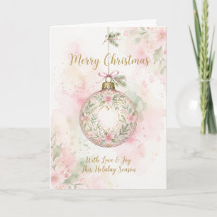 Tarjeta de Navidad alegre con adorno floral rosa