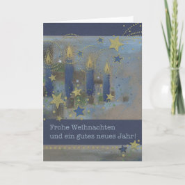 Tarjeta de navidad azul con candelas luminosas