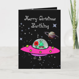 Tarjeta de navidad con Alien en una nave espacial 