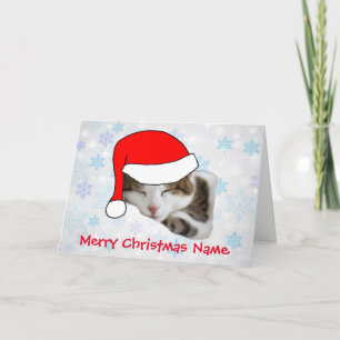 Tarjeta de Navidad con gato dormido y sombrero de