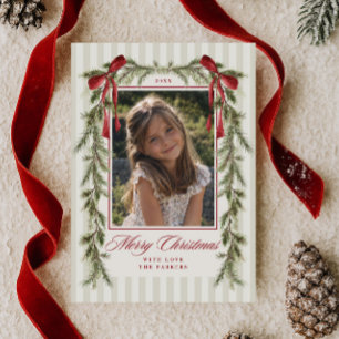 Tarjeta de Navidad con guirnalda de lazo rojo pere