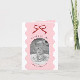 Tarjeta de Navidad con lazo rojo y borde escalonad