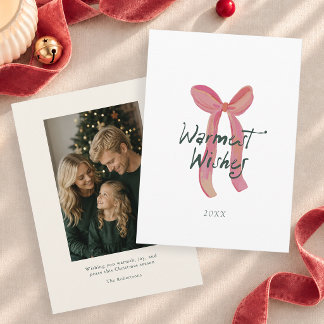 Tarjeta de Navidad con lazo rosa deseos más cálido