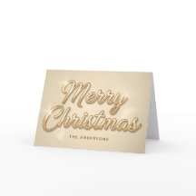 Tarjeta de Navidad con letra dorada de champán