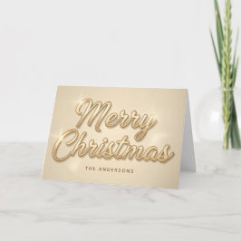 Tarjeta de Navidad con letra dorada de champán