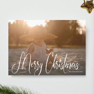 Tarjeta de Navidad con letra manuscrita blanca