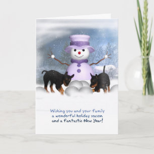 Tarjeta de Navidad con los perritos de Rottweiler