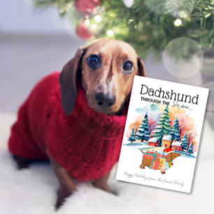 Tarjeta de Navidad: Dachshund a través de la nieve