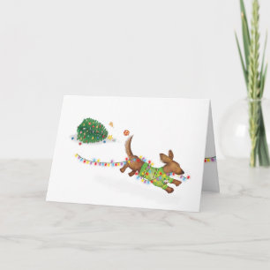 Tarjeta de Navidad de dachshund lindo con luces de