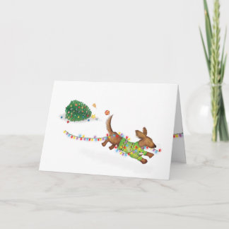 Tarjeta de Navidad de dachshund lindo con luces de
