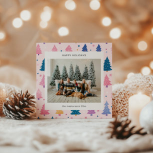 Tarjeta de Navidad de estilo cartoon con árboles d