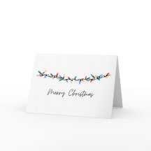 Tarjeta de navidad de las luces en blanco