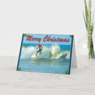 Tarjeta de Navidad de Santa que practica surf
