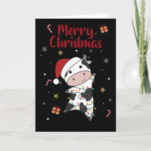 Tarjeta de Navidad de vacas alegres de invierno