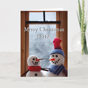 Tarjeta de Navidad del Papá y el Hijo en la Nieve 