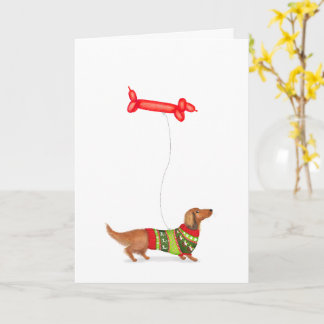 Tarjeta de Navidad del perro salchicha con globo D