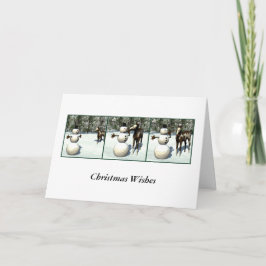 Tarjeta de Navidad del potro y del muñeco de nieve