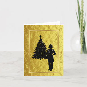 Tarjeta de Navidad dorada con silueta de doctora