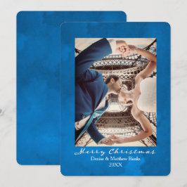 Tarjeta de Navidad elegante azul de nebulosas en a