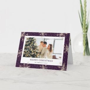Tarjeta de Navidad elegante morada con copo de nie