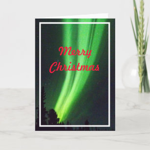 Tarjeta de Navidad hermosa de la aurora boreal