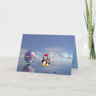 Tarjeta de Navidad linda con los pingüinos y el