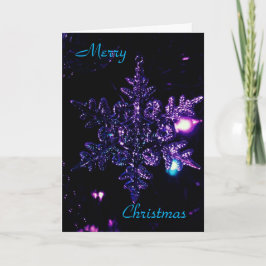 Tarjeta de Navidad negra con la estrella púrpura
