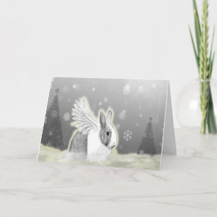 Tarjeta de Navidad que ofrece un conejito del