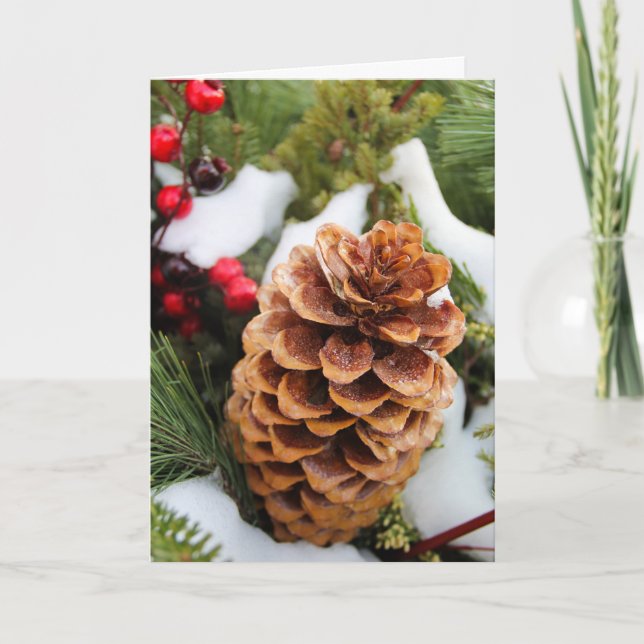Tarjeta de navidades con Pinecone y nieve (Anverso)