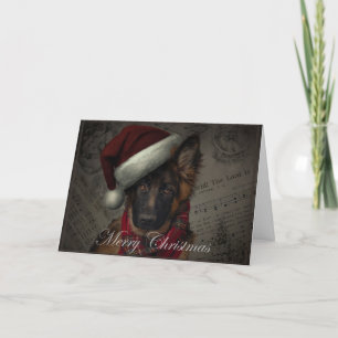 Tarjeta de Navidades de cachorro pastor alemán.